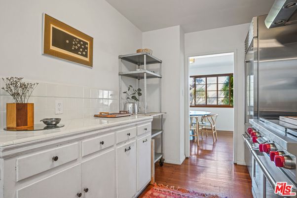 Dining room, Interior, Kitchen, Stainless Steel Appliances, Tile Countertops, Wood Texture Flooring