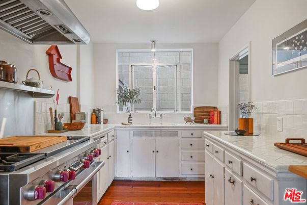 Interior, Kitchen, Stainless Steel Appliances, Tile Countertops, Wood Texture Flooring