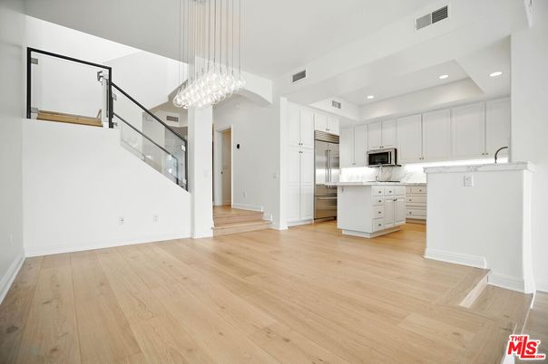 Chandelier, Interior, Kitchen, Recessed Lighting, Stainless Steel Appliances, Wood Texture Flooring