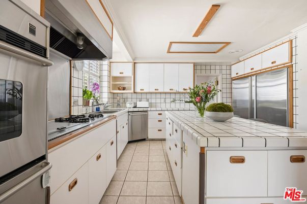 Interior, Kitchen, Stainless Steel Appliances, Tile Countertops, Wooden Beams