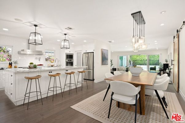 Dining room, Interior, Kitchen, Pendant Lights, Recessed Lighting, Stainless Steel Appliances, Wood Texture Flooring