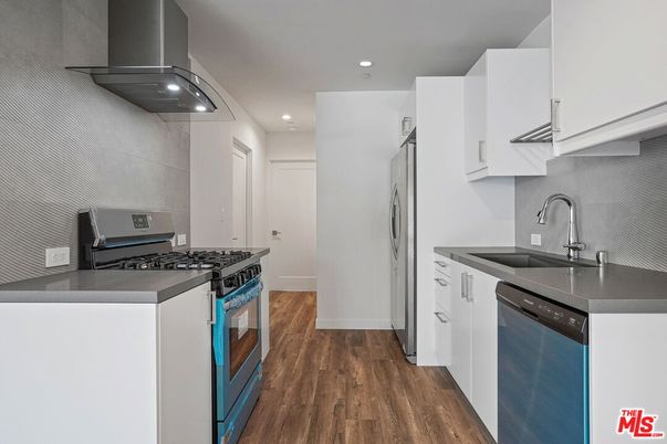 Interior, Kitchen, Recessed Lighting, Stainless Steel Appliances, Wood Texture Flooring