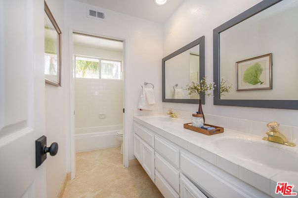 Bathroom, Dual Sink Vanities, Interior, Recessed Lighting, Tile Countertops