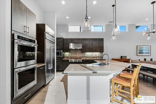 Dining room, Interior, Kitchen, Pendant Lights, Recessed Lighting, Stainless Steel Appliances, Wood Texture Flooring