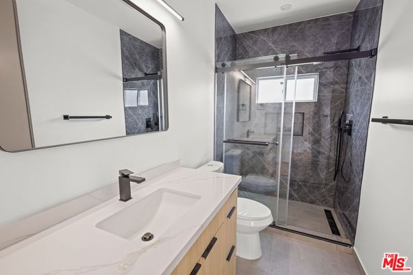 Bathroom, Dual Sink Vanities, Glass Shower, Interior, Marble Walls