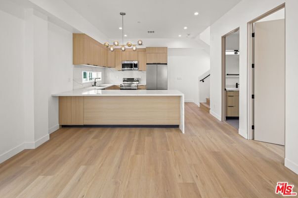 Interior, Kitchen, Pendant Lights, Recessed Lighting, Stainless Steel Appliances, Wood Texture Flooring