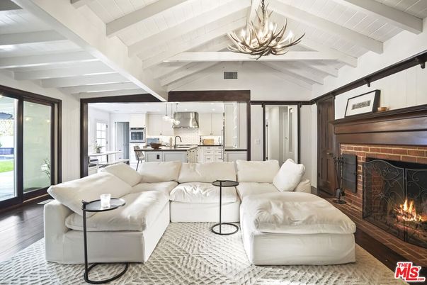 Chandelier, Fireplace, Interior, Kitchen, Living room, Pendant Lights, Recessed Lighting, Wood Texture Flooring