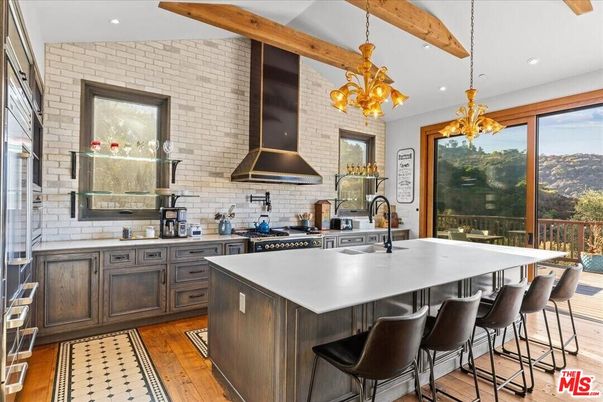Interior, Kitchen, Pendant Lights, Recessed Lighting, Stainless Steel Appliances, Stone Walls, Wooden Beams, Wood Texture Flooring