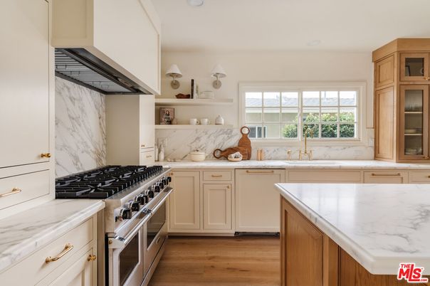 Interior, Kitchen, Marble Walls, Recessed Lighting, Stainless Steel Appliances, Wood Texture Flooring