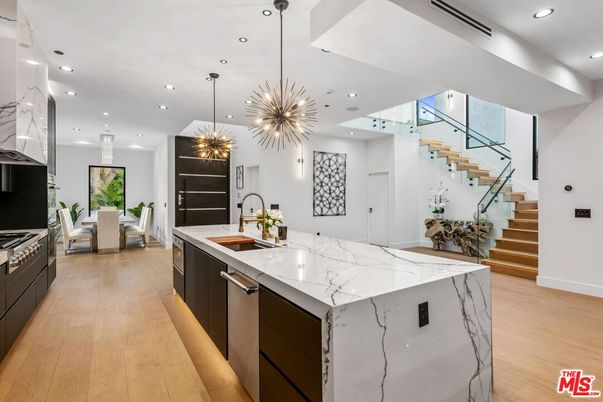 Dining room, Interior, Kitchen, Pendant Lights, Recessed Lighting, Stainless Steel Appliances, Wood Texture Flooring