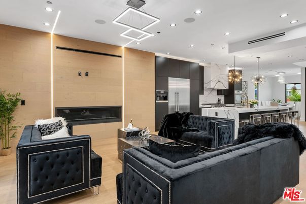Dining room, Fireplace, Interior, Kitchen, Living room, Pendant Lights, Recessed Lighting, Stainless Steel Appliances, Wood Texture Flooring