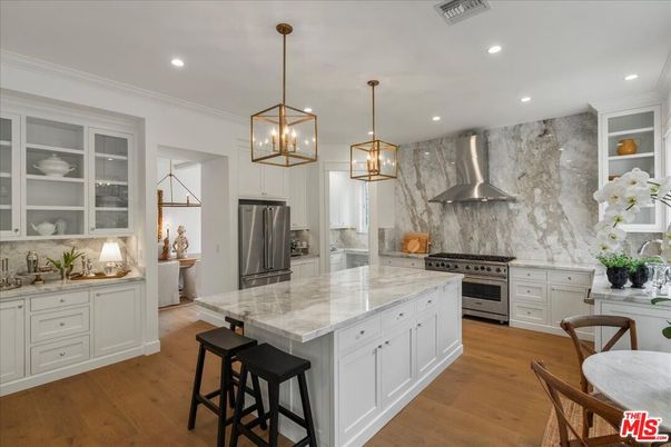Interior, Kitchen, Marble Walls, Pendant Lights, Recessed Lighting, Stainless Steel Appliances, Wood Texture Flooring
