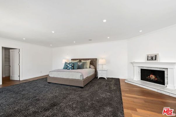 Bedroom, Fireplace, Interior, Recessed Lighting, Wood Texture Flooring