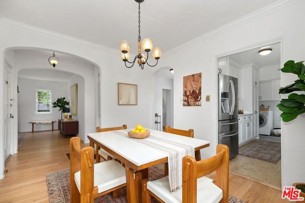 Chandelier, Dining room, Interior, Kitchen, Stainless Steel Appliances, Wood Texture Flooring