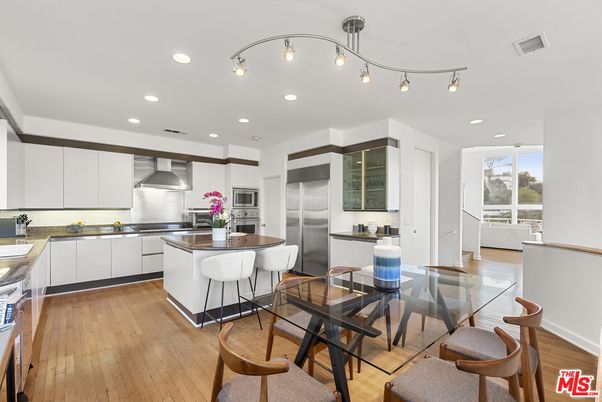 Dining room, Interior, Kitchen, Recessed Lighting, Stainless Steel Appliances, Wood Texture Flooring
