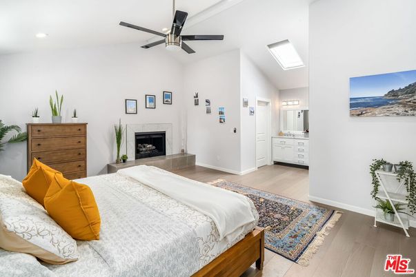 Bedroom, Fireplace, Interior, Recessed Lighting, Wood Texture Flooring