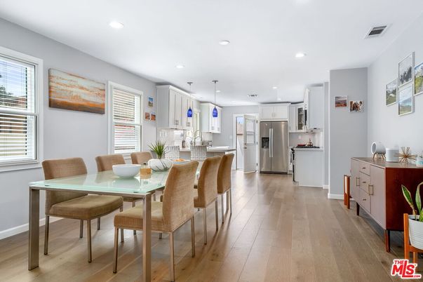 Dining room, Interior, Kitchen, Pendant Lights, Recessed Lighting, Stainless Steel Appliances, Wood Texture Flooring