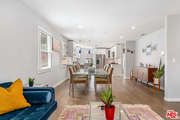 Dining room, Interior, Kitchen, Pendant Lights, Recessed Lighting, Stainless Steel Appliances, Wood Texture Flooring