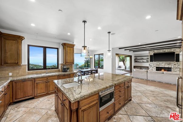 Fireplace, Interior, Kitchen, Living room, Pendant Lights, Recessed Lighting, Stainless Steel Appliances