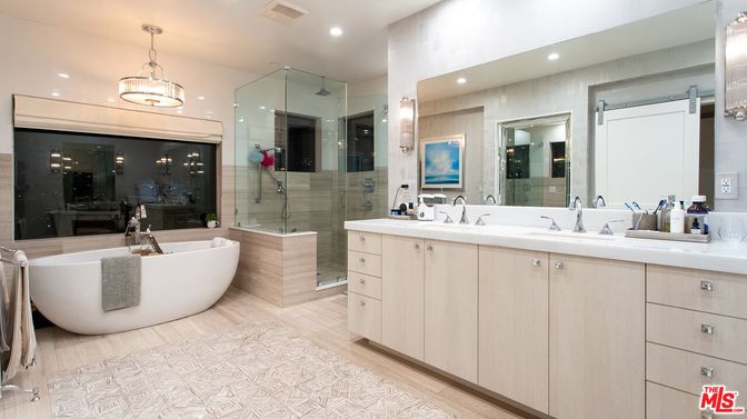 Bathroom, Dual Sink Vanities, Free Standing Baths, Glass Shower, Interior, Pendant Lights, Recessed Lighting, Wood Texture Flooring
