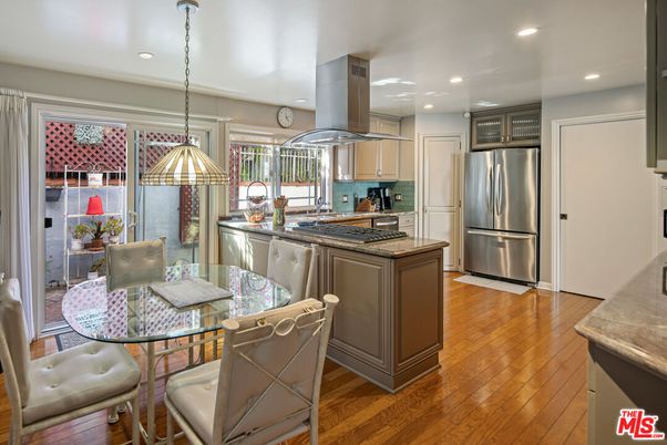 Dining room, Interior, Kitchen, Pendant Lights, Recessed Lighting, Stainless Steel Appliances, Wood Texture Flooring