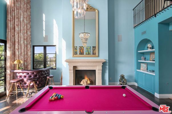 Billiard Table, Chandelier, Fireplace, Game Room, Interior, Pendant Lights, Wood Texture Flooring