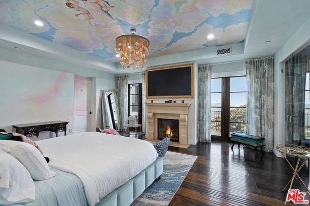 Bedroom, Chandelier, Fireplace, Interior, Recessed Lighting, Wood Texture Flooring