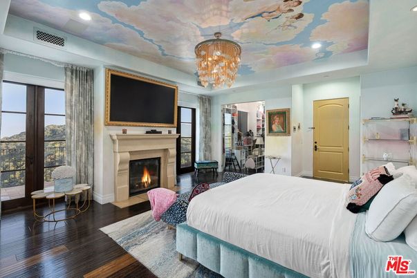 Bedroom, Chandelier, Fireplace, Interior, Recessed Lighting, Wood Texture Flooring