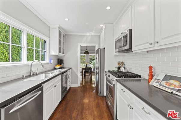 Dining room, Interior, Kitchen, Recessed Lighting, Stainless Steel Appliances, Wood Texture Flooring