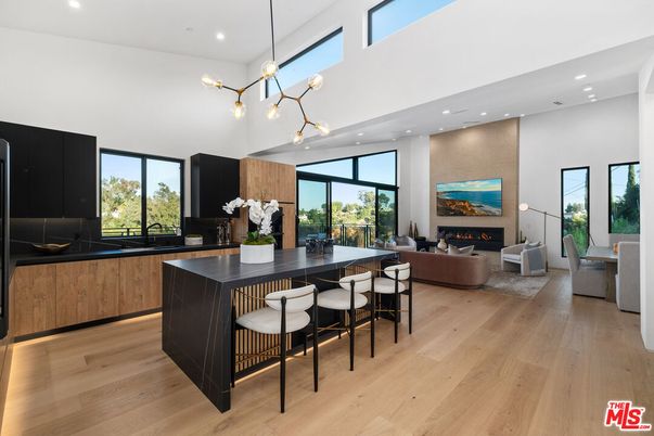 Dining room, Fireplace, Interior, Living room, Pendant Lights, Recessed Lighting, Wood Texture Flooring