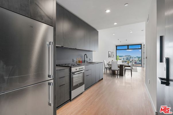 Dining room, Interior, Kitchen, Recessed Lighting, Stainless Steel Appliances, Wood Texture Flooring