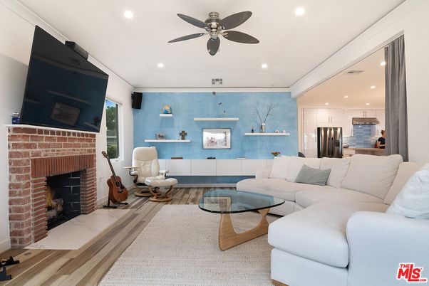 Fireplace, Interior, Kitchen, Living room, Recessed Lighting, Stainless Steel Appliances, Wood Texture Flooring