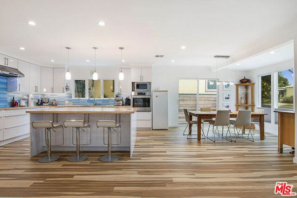 Dining room, Interior, Kitchen, Pendant Lights, Recessed Lighting, Stainless Steel Appliances, Wood Texture Flooring