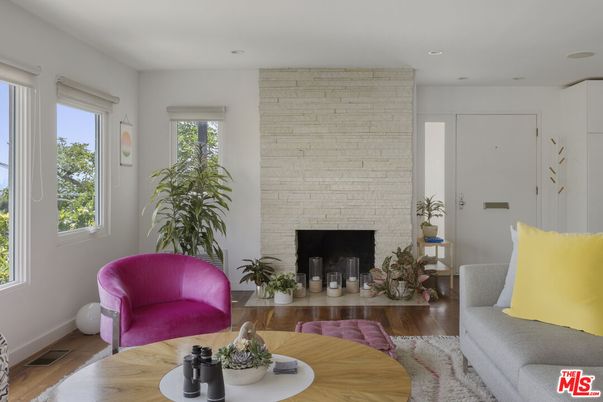 Fireplace, Interior, Living room, Recessed Lighting, Stone Walls, Wood Texture Flooring