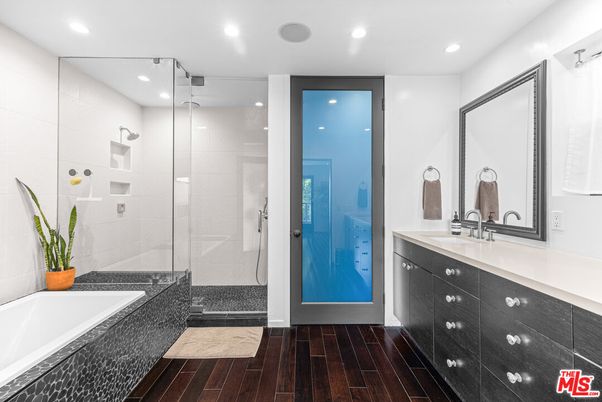 Bathroom, Dual Sink Vanities, Glass Shower, Interior, Recessed Lighting, Wood Texture Flooring