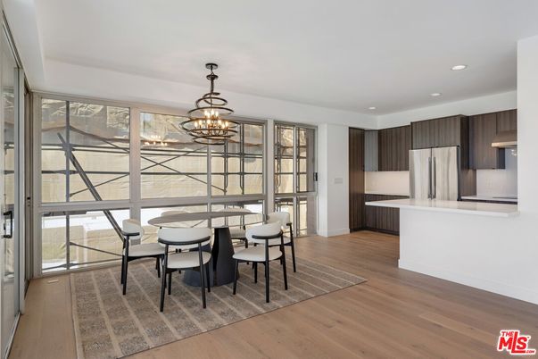 Chandelier, Dining room, Interior, Kitchen, Recessed Lighting, Stainless Steel Appliances, Wood Texture Flooring