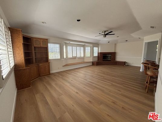 Empty room, Fireplace, Interior, Recessed Lighting, Wood Texture Flooring