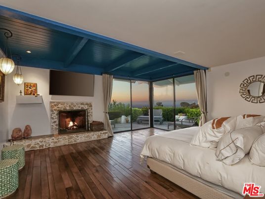 Bedroom, Fireplace, Interior, Pendant Lights, Recessed Lighting, Water, Wooden Ceilings, Wood Texture Flooring