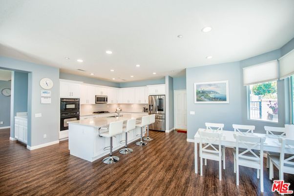 Dining room, Interior, Kitchen, Recessed Lighting, Stainless Steel Appliances, Wood Texture Flooring