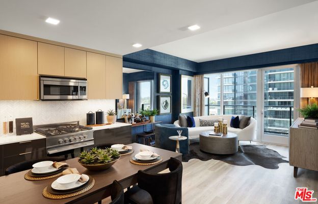 Dining room, Interior, Kitchen, Living room, Recessed Lighting, Stainless Steel Appliances, Wood Texture Flooring
