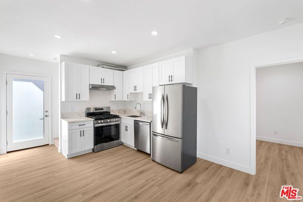 Interior, Kitchen, Recessed Lighting, Stainless Steel Appliances, Wood Texture Flooring