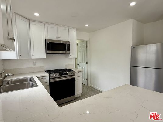 Interior, Kitchen, Recessed Lighting, Stainless Steel Appliances, Wood Texture Flooring
