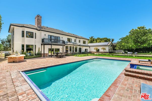 Exterior, Pool, Solar Panels