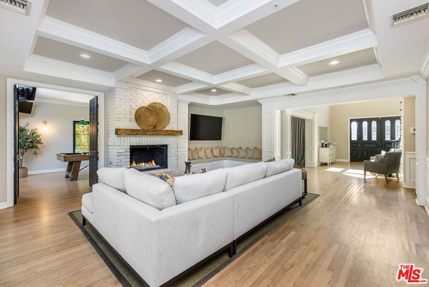 Billiard Table, Fireplace, Game Room, Interior, Living room, Recessed Lighting, Stone Walls, Wood Texture Flooring