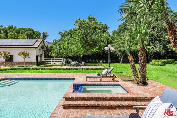 Exterior, Pool, Solar Panels