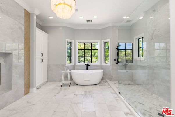 Bathroom, Chandelier, Free Standing Baths, Glass Shower, Interior, Marble, Marble Walls, Recessed Lighting