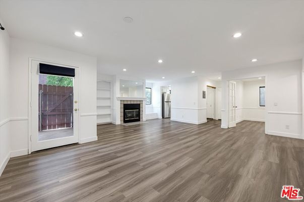 Empty room, Fireplace, Interior, Recessed Lighting, Wood Texture Flooring