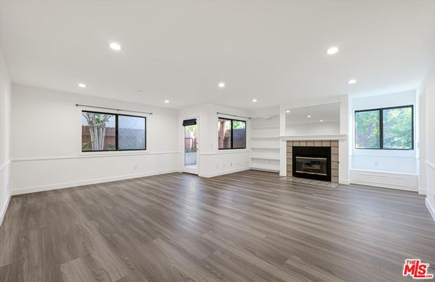Empty room, Fireplace, Interior, Recessed Lighting, Wood Texture Flooring