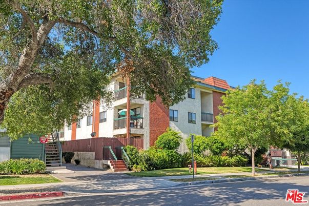 Exterior, Facade, Brick Facade, Condo Building