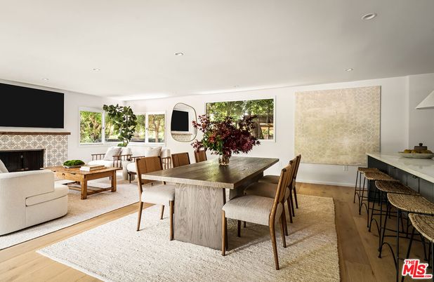 Dining room, Fireplace, Interior, Living room, Recessed Lighting, Wood Texture Flooring